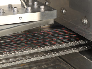Wire being fed into e-beam machine
